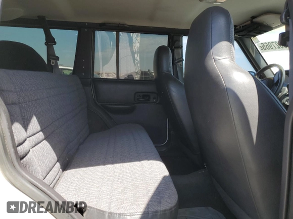 2000 Jeep Cherokee with VIN 1J4FT48S6YL152495, listed as a Copart auction lot 60627965 with 196,086 mi miles and Salvage title. Bid and sale history available at DreamBid. Image 11.