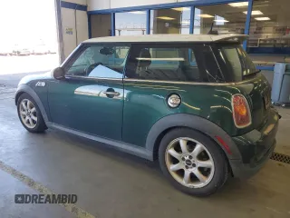 2007 MINI Hardtop S with VIN WMWMF73507TT80236, listed as a Copart auction lot 53049755 with 98,354 mi miles and Salvage Title. Bid and sale history available at DreamBid. Image 2.