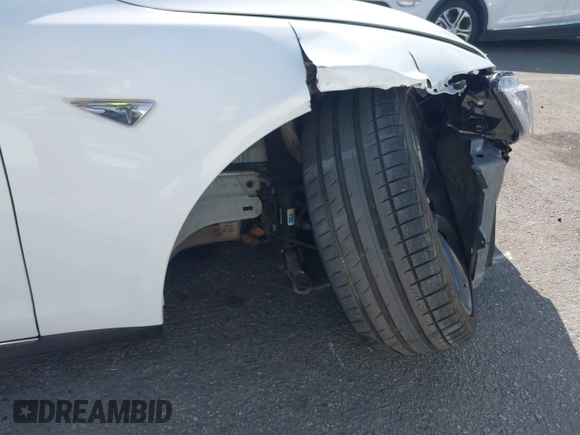 2014 Tesla Model S 60 with VIN 5YJSA1H15EFP46980, listed as a IAAI auction lot 41583672 with 61,080 mi miles and . Bid and sale history available at DreamBid. Image 6.