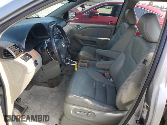 2006 Honda Odyssey EX-L z VIN 5FNRL38756B087695, wystawiony jako Copart lot #60122525 z przebiegiem 213 221 mil mil oraz Szkoda całkowita • Salvage title. Historia ofert i sprzedaży dostępna na DreamBid. Obrazek 7.