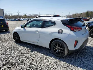 2020 Hyundai Veloster 2.0 с VIN KMHTG6AF7LU027994, выставлен на аукционе Copart как лот 52065775 с пробегом 87 433 миль миль и Списание • Salvage title. История ставок и продаж доступна на DreamBid. Изображение 2.