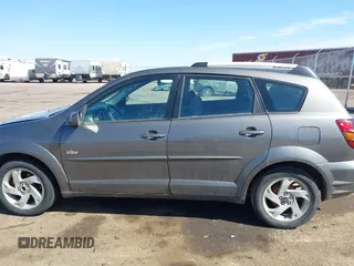 2005 Pontiac Vibe with VIN 5Y2SL63815Z464521, listed as a IAAI auction lot 41821708 with 290,636 mi miles. Bid and sale history available at carsss.com. Image 14.
