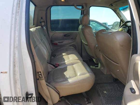 2002 Ford F-150 XLT with VIN 1FTRW07L32KE29159, listed as a Copart auction lot 50596125 with 198,058 mi miles and Salvage Title. Bid and sale history available at carsss.com. Image 10.