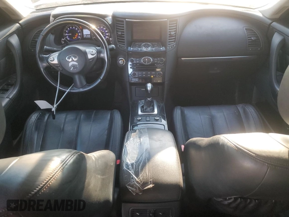 2014 Infiniti QX70 with VIN JN8CS1MU0EM452061, listed as a Copart auction lot 41790215 with 122,408 mi miles and Salvage Title. Bid and sale history available at DreamBid. Image 8.