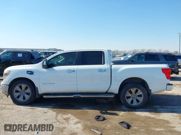 2017 Nissan Titan SL with VIN 1N6AA1E64HN565318, listed as a IAAI auction lot 41322120 with 114,515 mi miles and . Bid and sale history available at DreamBid. Image 14.