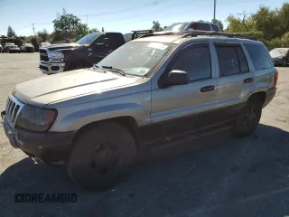 1999 Jeep Grand Cherokee Laredo с VIN 1J4GW58N4XC739465, выставлен на аукционе Copart как лот 76130544 с пробегом 195 649 миль миль и Списание • Salvage title. История ставок и продаж доступна на DreamBid. Изображение 1.