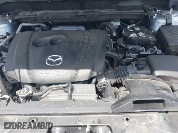 2017 Mazda CX-5 Sport with VIN JM3KFABLXH0135560, listed as a IAAI auction lot 42062016 with 153,416 mi miles. Bid and sale history available at carsss.com. Image 10.