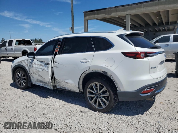 2016 Mazda CX-9 Grand Touring with VIN JM3TCADY9G0123193, listed as a Copart auction lot 50123825 with 65,588 mi miles and Salvage Title. Bid and sale history available at DreamBid. Image 2.