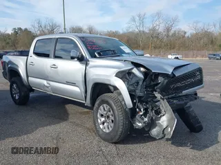 2018 Toyota Tacoma SR5 with VIN 5TFAZ5CN6JX057889, listed as a IAAI auction lot 41449604 with 114,888 mi miles and . Bid and sale history available at DreamBid. Image 1.