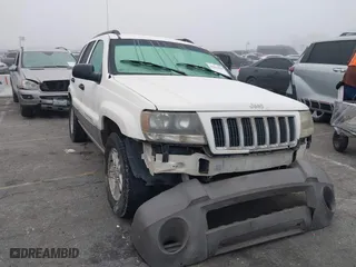 2004 Jeep Grand Cherokee Laredo with VIN 1J4GW48SX4C363009, listed as a IAAI auction lot 41632998 with 158,630 mi miles. Bid and sale history available at carsss.com. Image 1.