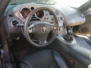 2007 Pontiac Solstice GXP z VIN 1G2MG35X77Y122388, wystawiony jako Copart lot #44040685 z przebiegiem 95 386 mil mil oraz Szkoda całkowita • Salvage title. Historia ofert i sprzedaży dostępna na DreamBid. Obrazek 8.