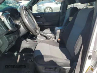 2020 Toyota Tacoma SR5 with VIN 3TMAZ5CN8LM115056, listed as a Copart auction lot 46948805 with 87,713 mi miles and Salvage title. Bid and sale history available at DreamBid. Image 7.