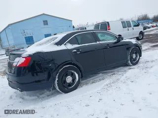 2014 Ford Sedan Police Interceptor with VIN 1FAHP2MK9EG101144, listed as a IAAI auction lot 41755855 with 160,659 mi miles. Bid and sale history available at carsss.com. Image 4.