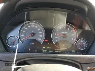 2015 BMW M4 with VIN WBS3R9C50FK335084, listed as a Copart auction lot 61962965 with 142,157 mi miles and Salvage title. Bid and sale history available at DreamBid. Image 9.