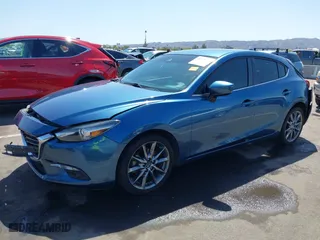2018 Mazda Mazda3 5-Door Grand Touring with VIN 3MZBN1M31JM201468, listed as a IAAI auction lot 41975539 with 78,438 mi miles. Bid and sale history available at carsss.com. Image 17.