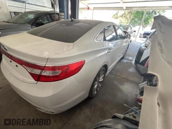 2013 Hyundai Azera с VIN KMHFG4JG4DA283684, выставлен на аукционе Copart как лот 62190285 с пробегом 58 994 миль миль и Чистый • Clean title. История ставок и продаж доступна на DreamBid. Изображение 4.