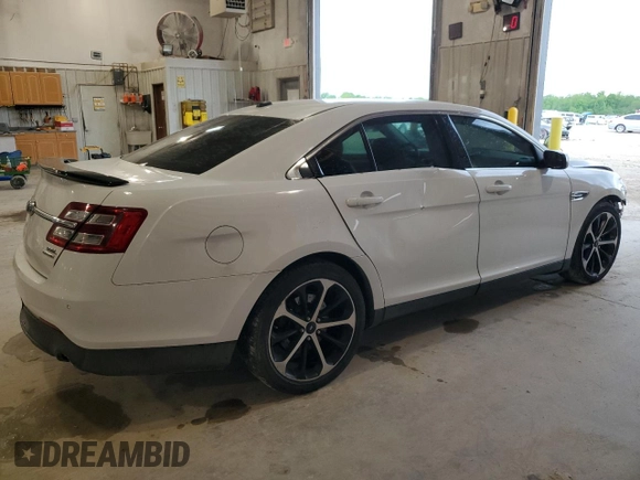 2014 Ford Taurus SEL z VIN 1FAHP2E89EG121025, wystawiony jako Copart lot #55405535 z przebiegiem 168 004 mil mil oraz Czysty tytuł • Clean title. Historia ofert i sprzedaży dostępna na DreamBid. Obrazek 3.