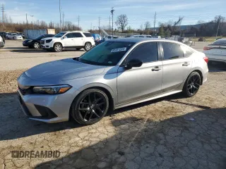 2022 Honda Civic Sport z VIN 2HGFE2F55NH557923, wystawiony jako Copart lot #85451234 z przebiegiem Nie podano mil oraz Szkoda całkowita • Salvage title. Historia ofert i sprzedaży dostępna na DreamBid. Obrazek 1.