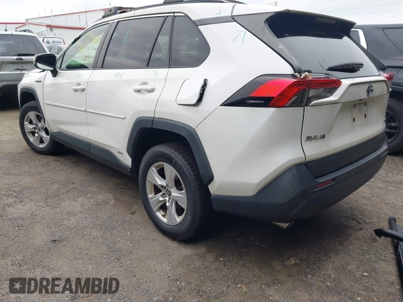 2019 Toyota RAV4 Hybrid LE with VIN JTMMWRFV9KD021285, listed as a IAAI auction lot 42757660 with 74,870 mi miles and . Bid and sale history available at DreamBid. Image 3.