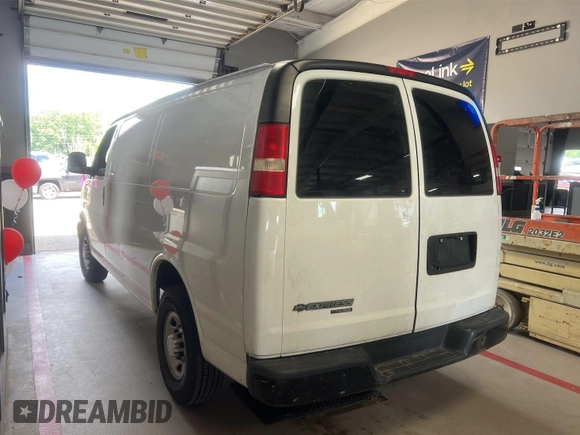 2014 Chevrolet Express Cargo with VIN 1GCWGFCA2E1184095, listed as a IAAI auction lot 42725036 with 270,636 mi miles and . Bid and sale history available at DreamBid. Image 13.