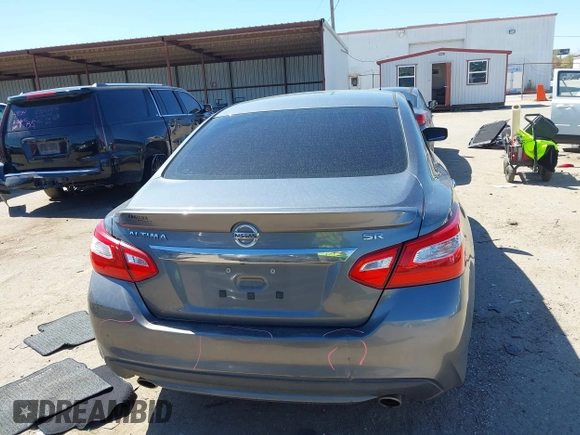 2016 Nissan Altima SR with VIN 1N4AL3AP1GC285363, listed as a IAAI auction lot 41754598 with 121,923 mi miles and . Bid and sale history available at carsss.com. Image 16.