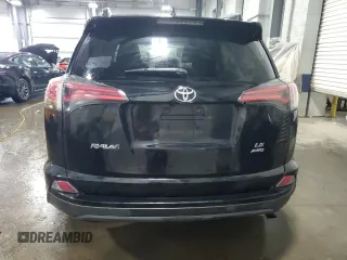 2017 Toyota RAV4 LE with VIN 2T3BFREV3HW617738, listed as a Copart auction lot 58712515 with 117,310 mi miles and Salvage title. Bid and sale history available at DreamBid. Image 6.