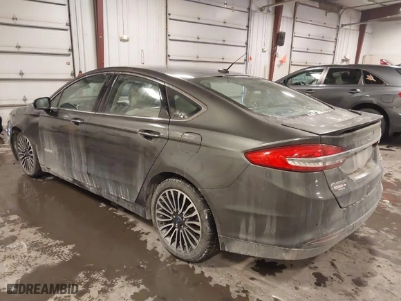 2018 Ford Fusion Hybrid Titanium with VIN 3FA6P0RU4JR147831, listed as a IAAI auction lot 41586033 with 101,088 mi miles. Bid and sale history available at carsss.com. Image 3.