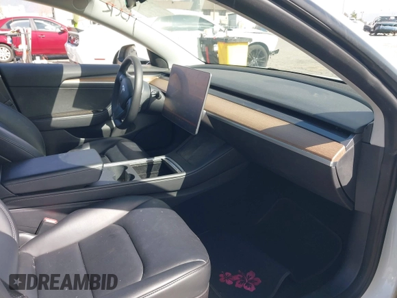 2023 Tesla Model 3 with VIN 5YJ3E1EA8PF398110, listed as a IAAI auction lot 41692006 with 112,699 mi miles and . Bid and sale history available at carsss.com. Image 5.