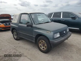 1994 Geo Tracker z VIN 2CNBE18U1R6918878, wystawiony jako Copart lot #75894834 z przebiegiem Nie podano mil oraz Nie do naprawy. Historia ofert i sprzedaży dostępna na DreamBid. Obrazek 4.