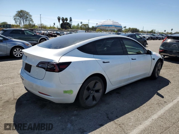 2023 Tesla Model 3 with VIN 5YJ3E1EA9PF401418, listed as a Copart auction lot 50597015 with 79,673 mi miles and Salvage Title. Bid and sale history available at DreamBid. Image 3.