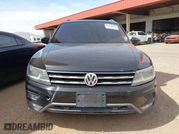 2020 Volkswagen Tiguan SE z VIN 3VV3B7AX7LM039084, wystawiony jako IAAI lot #42249016 z przebiegiem 126 763 mil mil oraz . Historia ofert i sprzedaży dostępna na DreamBid. Obrazek 12.