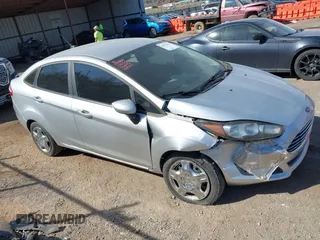 2016 Ford Fiesta S z VIN 3FADP4AJ2GM138776, wystawiony jako IAAI lot #41879870 z przebiegiem 83 769 mil mil oraz . Historia ofert i sprzedaży dostępna na DreamBid. Obrazek 13.
