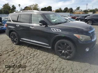 2012 Infiniti QX56 7-passenger with VIN JN8AZ2NE1C9016500, listed as a Copart auction lot 74600284 with 145,656 mi miles and Salvage Title. Bid and sale history available at carsss.com. Image 4.