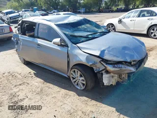 2015 Toyota Avalon Limited with VIN 4T1BK1EBXFU141061, listed as a IAAI auction lot 41943384 with Not Provided miles and . Bid and sale history available at carsss.com. Image 1.
