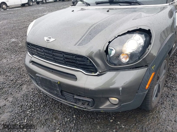 2014 MINI Cooper Countryman S with VIN WMWZC5C56EWP40320, listed as a IAAI auction lot 41792374 with 103,894 mi miles. Bid and sale history available at carsss.com. Image 6.
