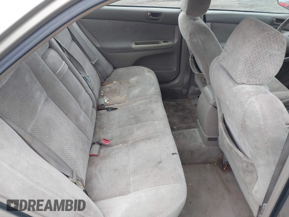 2004 Toyota Camry LE with VIN 4T1BE30KX4U327013, listed as a IAAI auction lot 41987105 with 241,236 mi miles. Bid and sale history available at carsss.com. Image 8.