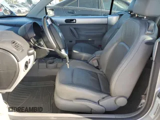 2004 Volkswagen Beetle with VIN 3VWCM21Y34M300701, listed as a Copart auction lot 77567344 with 91,236 mi miles and Salvage Title. Bid and sale history available at DreamBid. Image 7.