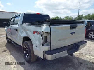 2019 Ford F-150 XL with VIN 1FTEW1E55KKC58276, listed as a IAAI auction lot 42133235 with 97,032 mi miles. Bid and sale history available at carsss.com. Image 3.