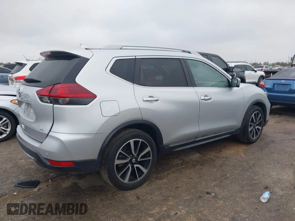 2020 Nissan Rogue SL with VIN 5N1AT2MTXLC701980, listed as a IAAI auction lot 41032122 with 85,287 mi miles. Bid and sale history available at carsss.com. Image 4.