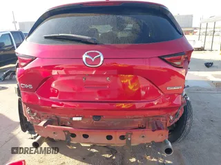 2020 Mazda CX-5 Grand Touring with VIN JM3KFADM7L0729537, listed as a IAAI auction lot 41864569 with 82,998 mi miles. Bid and sale history available at carsss.com. Image 17.