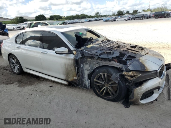 2016 BMW 7 Series 750i xDrive with VIN WBA7F2C59GG415722, listed as a Copart auction lot 75942273 with 0 mi miles. Bid and sale history available at carsss.com. Image 4.
