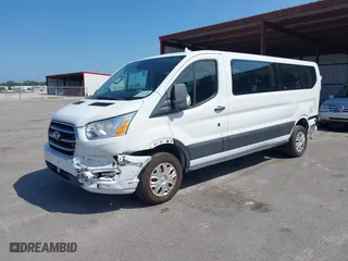 2020 Ford Transit Passenger Wagon XL with VIN 1FBAX2Y89LKA23229, listed as a IAAI auction lot 41937635 with 83,536 mi miles. Bid and sale history available at carsss.com. Image 20.