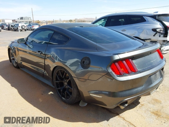 2015 Ford Mustang V6 with VIN 1FA6P8AM5F5318400, listed as a IAAI auction lot 41812625 with 97,728 mi miles and . Bid and sale history available at DreamBid. Image 3.