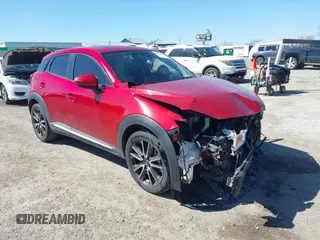 2016 Mazda CX-3 Grand Touring with VIN JM1DKBD71G0112329, listed as a IAAI auction lot 41662610 with 145,329 mi miles. Bid and sale history available at carsss.com. Image 1.