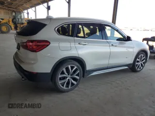 2016 BMW X1 xDrive28i z VIN WBXHT3C35GP881610, wystawiony jako Copart lot #57690625 z przebiegiem 189 579 mil mil oraz Czysty tytuł • Clean title. Historia ofert i sprzedaży dostępna na DreamBid. Obrazek 3.