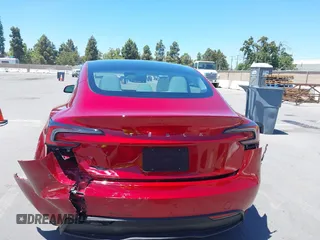 2025 Tesla Model 3 Long Range with VIN 5YJ3E1EA6SF917745, listed as a IAAI auction lot 42533673 with 7,305 mi miles and . Bid and sale history available at DreamBid. Image 16.