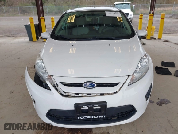 2013 Ford Fiesta S with VIN 3FADP4TJ4DM226897, listed as a IAAI auction lot 41916651 with 56,714 mi miles and . Bid and sale history available at DreamBid. Image 11.