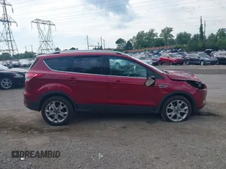 2015 Ford Escape Titanium with VIN 1FMCU9J94FUC54505, listed as a IAAI auction lot 42557608 with 93,007 mi miles and . Bid and sale history available at DreamBid. Image 14.