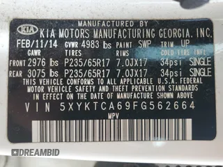 2015 Kia Sorento LX with VIN 5XYKTCA69FG562664, listed as a Copart auction lot 63301385 with 156,729 mi miles and Clean title. Bid and sale history available at DreamBid. Image 12.