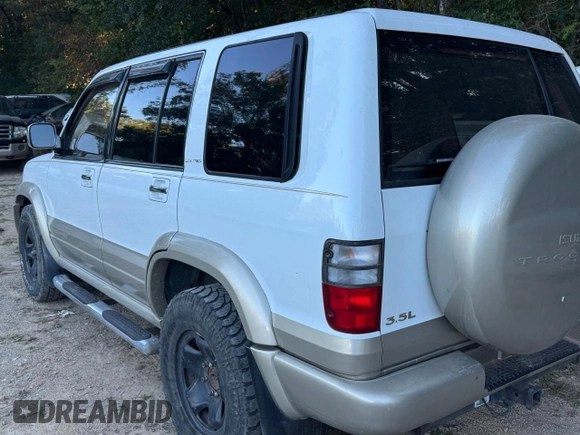 2001 Isuzu Trooper S z VIN JACDJ58X417J03071, wystawiony jako Copart lot #77033444 z przebiegiem 151 982 mil mil oraz Szkody całkowita. Historia ofert i sprzedaży dostępna na DreamBid. Obrazek 3.